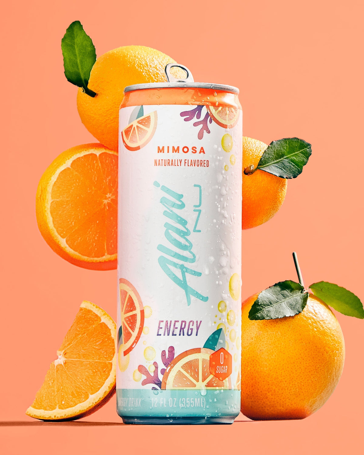 A Energy Drink in Mimosa flavor surrounded by oranges.